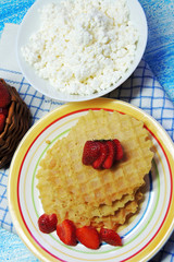 waffles and fruit, strawberries and cherries