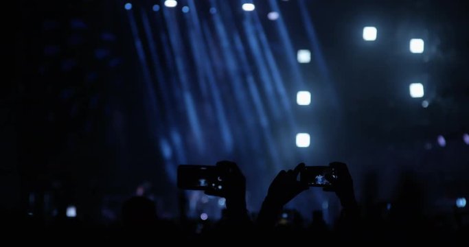 People with Mobile Phones on a Concert