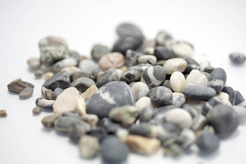 Sea pebbles on a white background