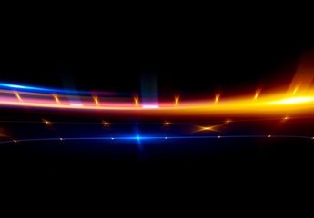 Beautiful light flares. Glowing streaks on dark background. Luminous abstract sparkling lined background. .light effect wallpaper. Sci fi technology. Sequins backdrop. New gala. .