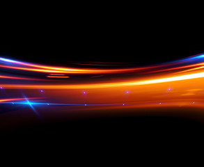 Beautiful light flares. Glowing streaks on dark background. Luminous abstract sparkling lined background. .light effect wallpaper. Sci fi technology. Sequins backdrop. New gala. .