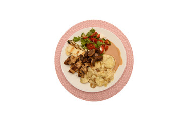 Plate with fillet of pork, potato gratin, marinated meadow mushroom,halomy cheese and cream sauce