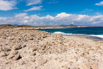 Agios Konstantinos, rocky and quiet beach in the north side of the Milos island. Cyclades, Greece.