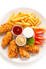 Fried chicken nuggets and vegetables 
