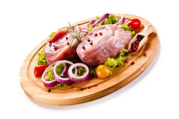 Fresh raw pork on cutting board on white background 