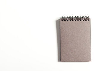 Blank paper notebook on white background