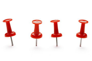 Push pins isolated on white background.