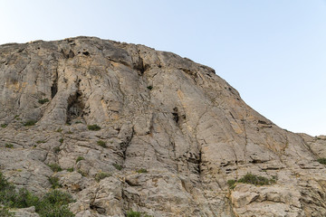High mountain with smooth walls and uneven top unapproachable majestic