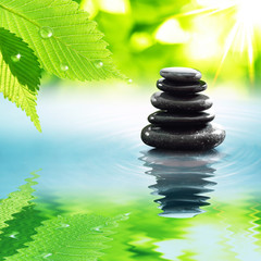 Obraz na płótnie Canvas Balanced Zen stones in water