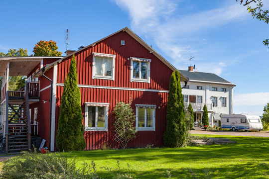 Red Swedish typical house in small town Hedemora