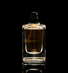 Perfume bottle on black background