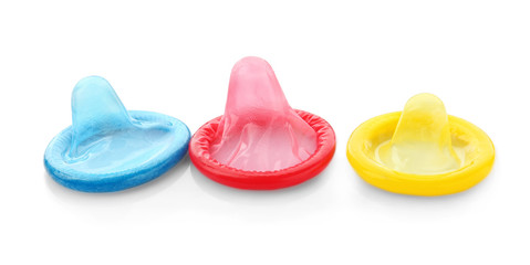 Colorful condoms on white background. Safe sex concept