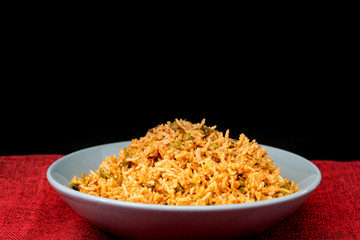 Homemade Chinese fried rice with vegetables and fried eggs