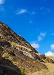 Naklejka premium Moai at the quarry on the slope of the Rano Raraku Volcano, Rapa Nui National Park, Easter Island, Chile