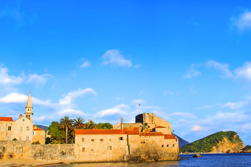 BUDVA, MONTENEGRO - JULY 10: Beautiful view of the old town of Budva and the bell tower of the...