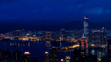 Fototapeta na wymiar Hong Kong iconic night view from Victoria peak, Beautiful light illuminate skyscraper