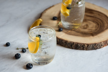 Fresh cocktail with Lemon soda, lime, lemon on the table