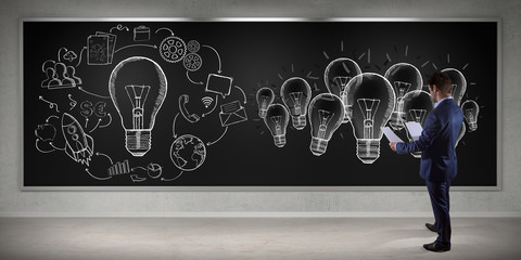 Businessman watching innovation sketch on a board 3D rendering