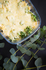 casserole with broccoli, cheese and cream, close-up
