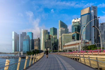Asian man Jogging in business city of Singapore