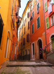 Fototapeta na wymiar street in old town of Nice, France, retro toned