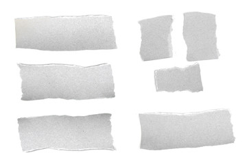 collection of white ripped pieces of paper isolated on white background. each one is shot separately