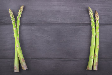 Fresh asparagus on wooden rustic background. Copy space - 162848985