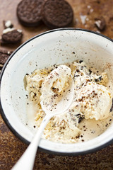 Cookie and cream ice cream in white bowl 