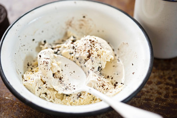 Cookie and cream ice cream in white bowl 