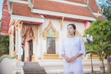 Buddhist Nuns meditation in  thailand. Concept: Lent