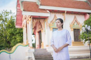 Buddhist Nuns meditation in  thailand. Concept: Lent
