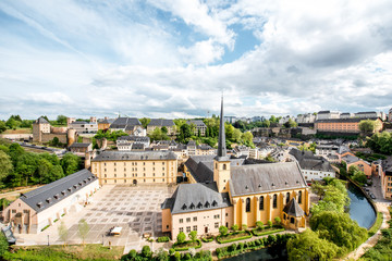Fototapeta premium Top view on the Grund district with saint Johns church and Neumunster abbey in Luxembourg city