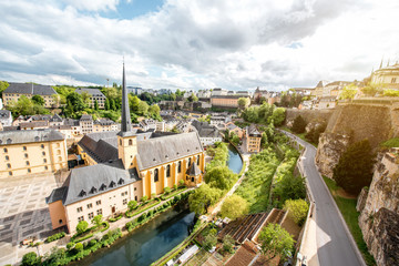 Top view on the Grund district with saint Johns church and Neumunster abbey in Luxembourg city - obrazy, fototapety, plakaty