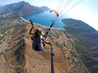 Fly in the sky above laguna Paragliding tandem