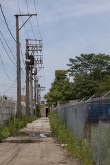 Obraz premium Strommasten an einer Strasse