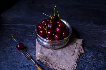 cherries in bowl on the table
