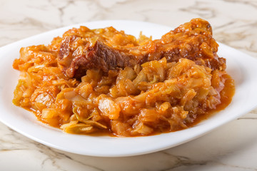 Cabbage cooked with Smoked Pork Ribs