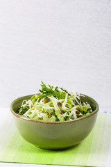 Coleslaw Cabbage Salad with Pumpkin Seeds. Selective focus.