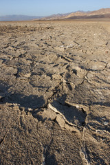 Dry cracked earth in Salt Flats, Death Valley, NP, CA