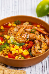 Tomato Soup With Shrimp, Broccoli and Corn. Selective focus.