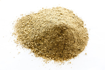Brown pile powder isolated on white