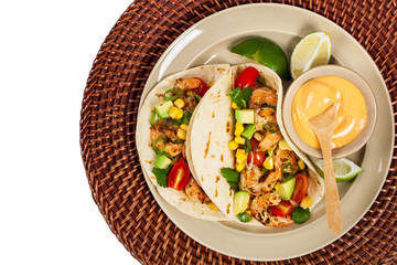 Shrimp Tacos with Corn and Avocado Salsa. Selective focus.