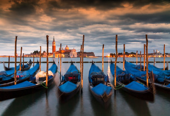 Long exposure of gondolas in the Grand Canal, Venice, Italy