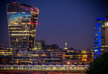 Fototapeta na wymiar London business district view with the walkie talkie skyscraper at night