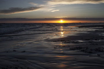 Beautiful sunset landscape at baltic sea. Amazing summer sunset view on the beach. Liepaja