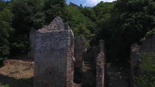 flying over Ruins of Orsini - Altieri Castle, Canale Monterano, Rome, Lazio, Italy