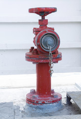 Red fire hydrant valve