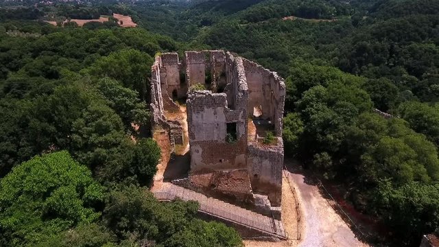 aerial shot of the ruins of Orsini - Altieri Castle, Canale Monterano, Lazio, Italy