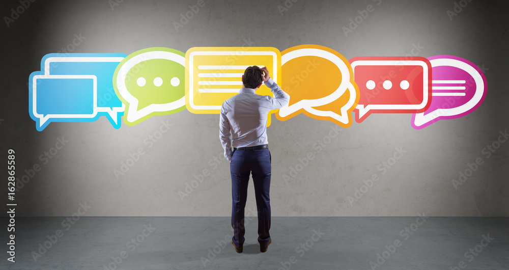 Wall mural businessman using social network interface on a wall 3d rendering