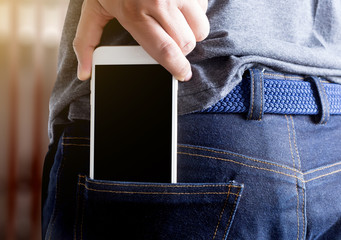 Phone Pocket  smart mobile Communication  in  jeans Copy Space